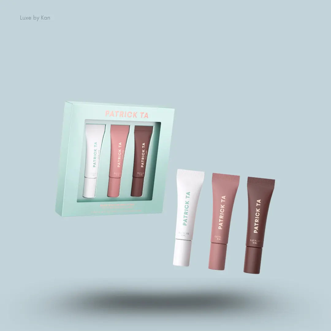 Patrick Ta Major Moisture Lip Trio – three lip balms with packaging on blue background