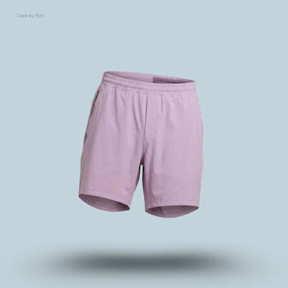 Lululemon Pace Breaker Linerless Short 7" in lavender, front view on light blue background