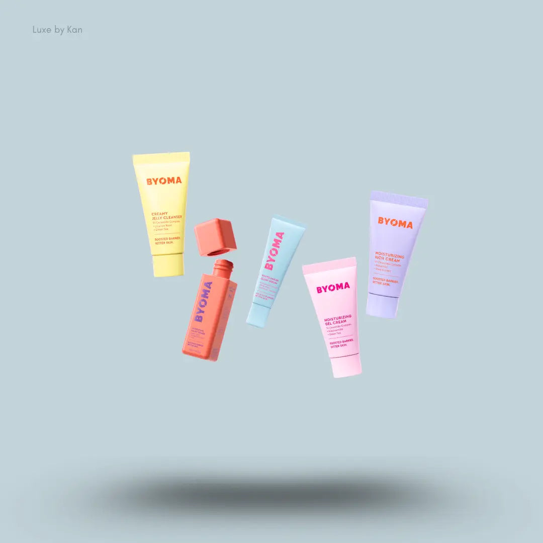 BYOMA The Barrier Boosting Lab Kit five skincare products on a blue background