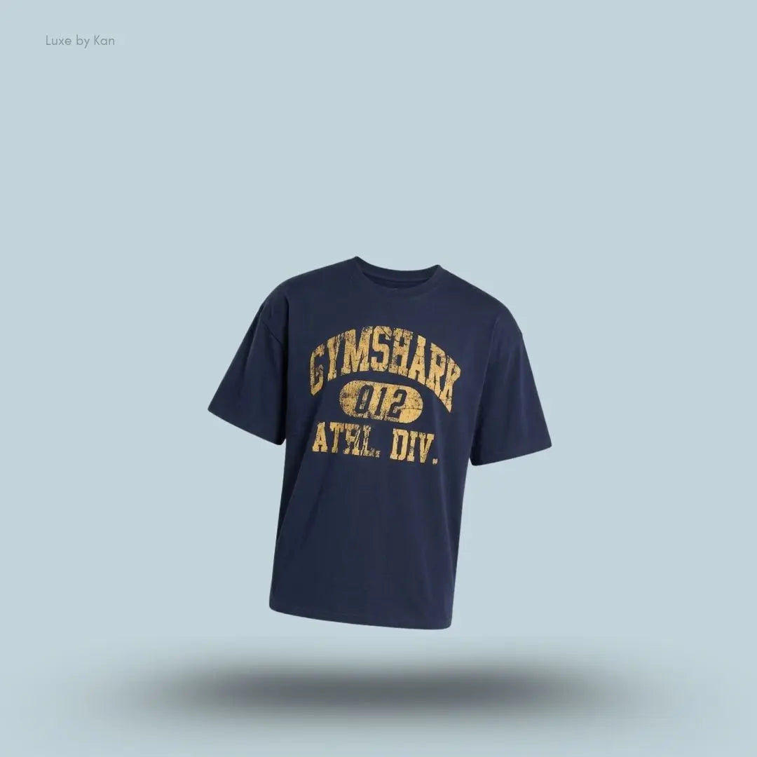Gymshark Athletic Division Graphic T-Shirt in hard blue with front graphic print on a blue background