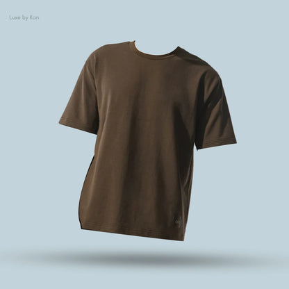 Alo Double Take Short Sleeve in Espresso, flat lay on light blue background