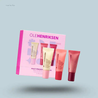 OLEHENRIKSEN Pout Petites Mini Lip Trio three Pout Preserve peptide lip treatments with box on blue background