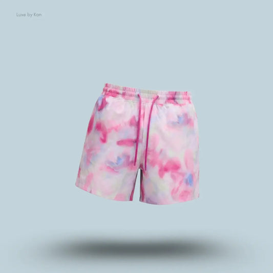 Lululemon Swim Short 5" Lined in Floral Glow Pink Multi, flat lay on light blue background