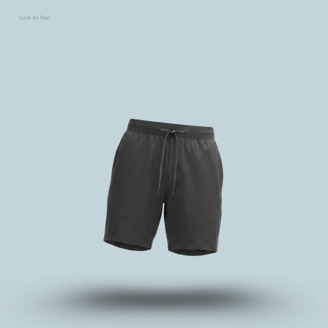 Lululemon Zeroed In Linerless Short 7 inch in Graphite Grey, flat lay on light blue background