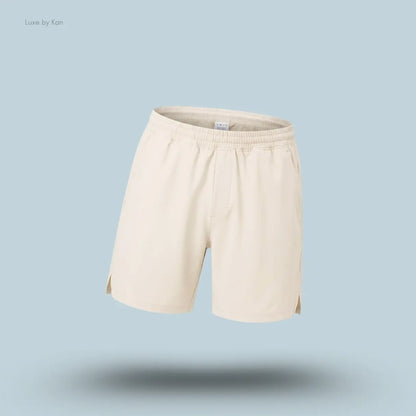 Lululemon Pace Breaker Linerless Short 7" in ivory, front view on light blue background