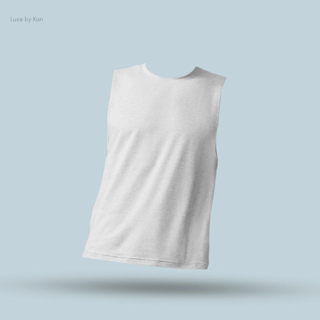 Alo Conquer Muscle Tank in Athletic Heather Grey, flat lay on light blue background