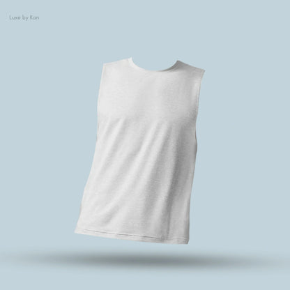 Alo Conquer Muscle Tank in Athletic Heather Grey, flat lay on light blue background