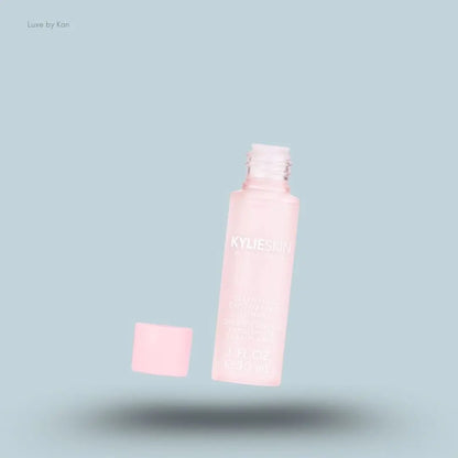 Kylie Cosmetics Clarifying Exfoliating Toner bottle on blue background — Luxe by Kan India