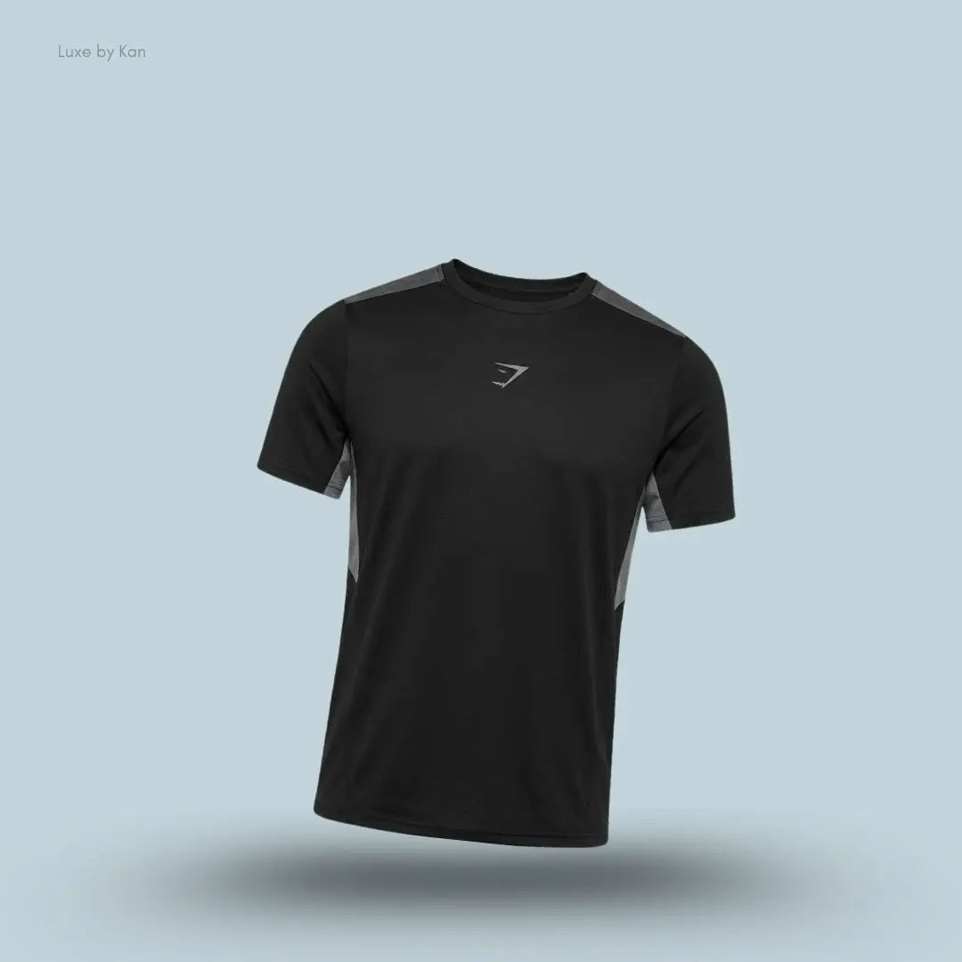 gymshark Sport T-Shirt in black with short sleeves and front logo, men's slim-fit performance training tee on blue background.