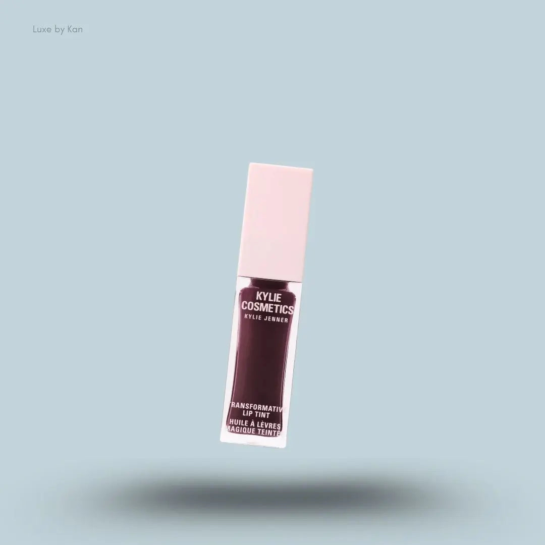 Kylie Cosmetics Holiday Collection Transformative Lip Tint 6ml bottle on blue background — LBK
