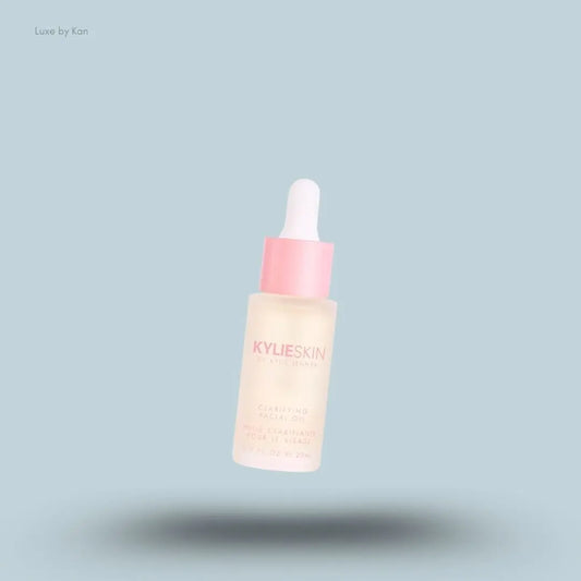 Kylie Skin by Kylie Jenner Clarifying Facial Oil bottle on blue background — LBK India