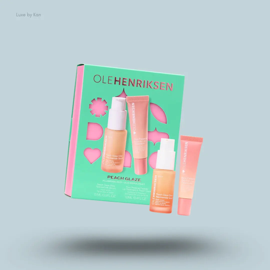 OLEHENRIKSEN Peach Glaze Plumping Duo niacinamide glow serum and peptide lip treatment with box on blue background