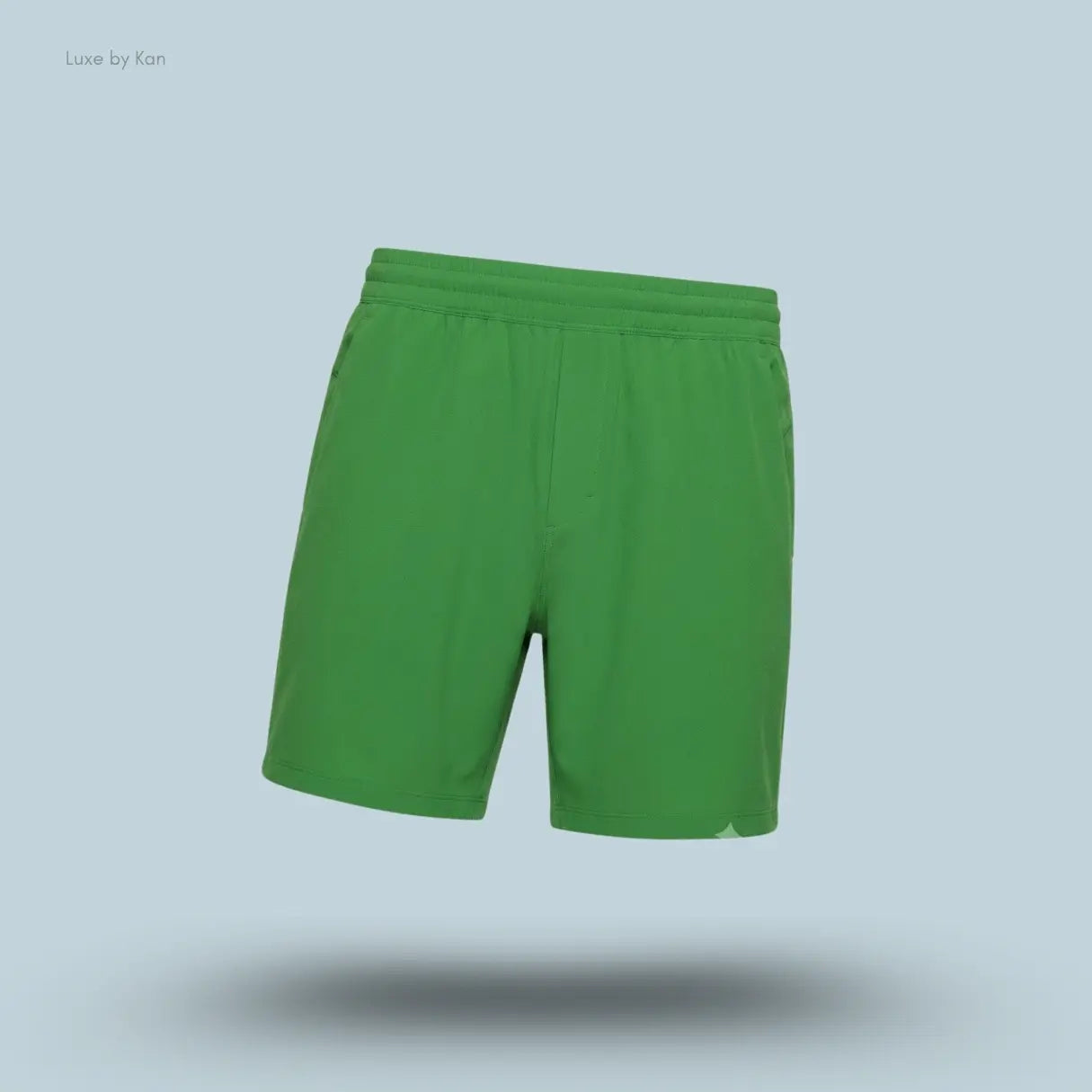 Lululemon Pace Breaker Linerless Short 7" in green, front view on light blue background