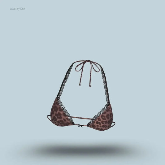 SKIMS Fits Everybody Lace Micro Bralette in Limited Edition Umber Leopard Print, flat lay on light blue background