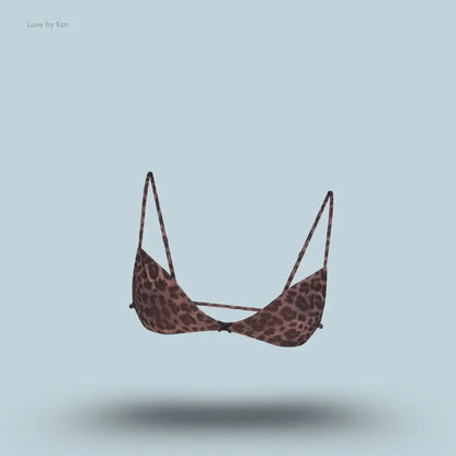SKIMS Fits Everybody Micro Skimpy Bralette in Limited Edition Umber Leopard Print, flat lay on light blue background