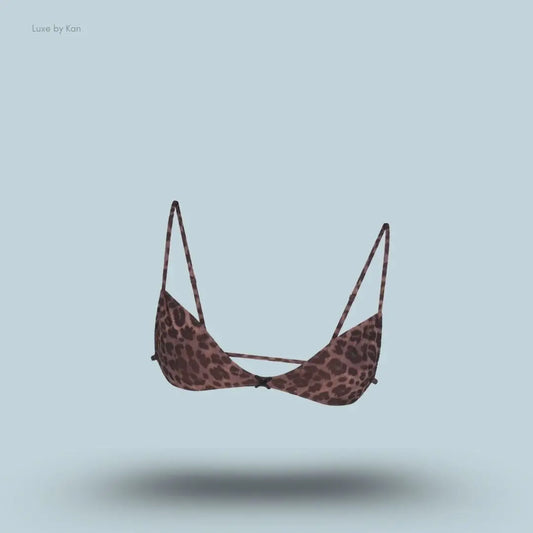 SKIMS Fits Everybody Micro Skimpy Bralette in Limited Edition Umber Leopard Print, flat lay on light blue background