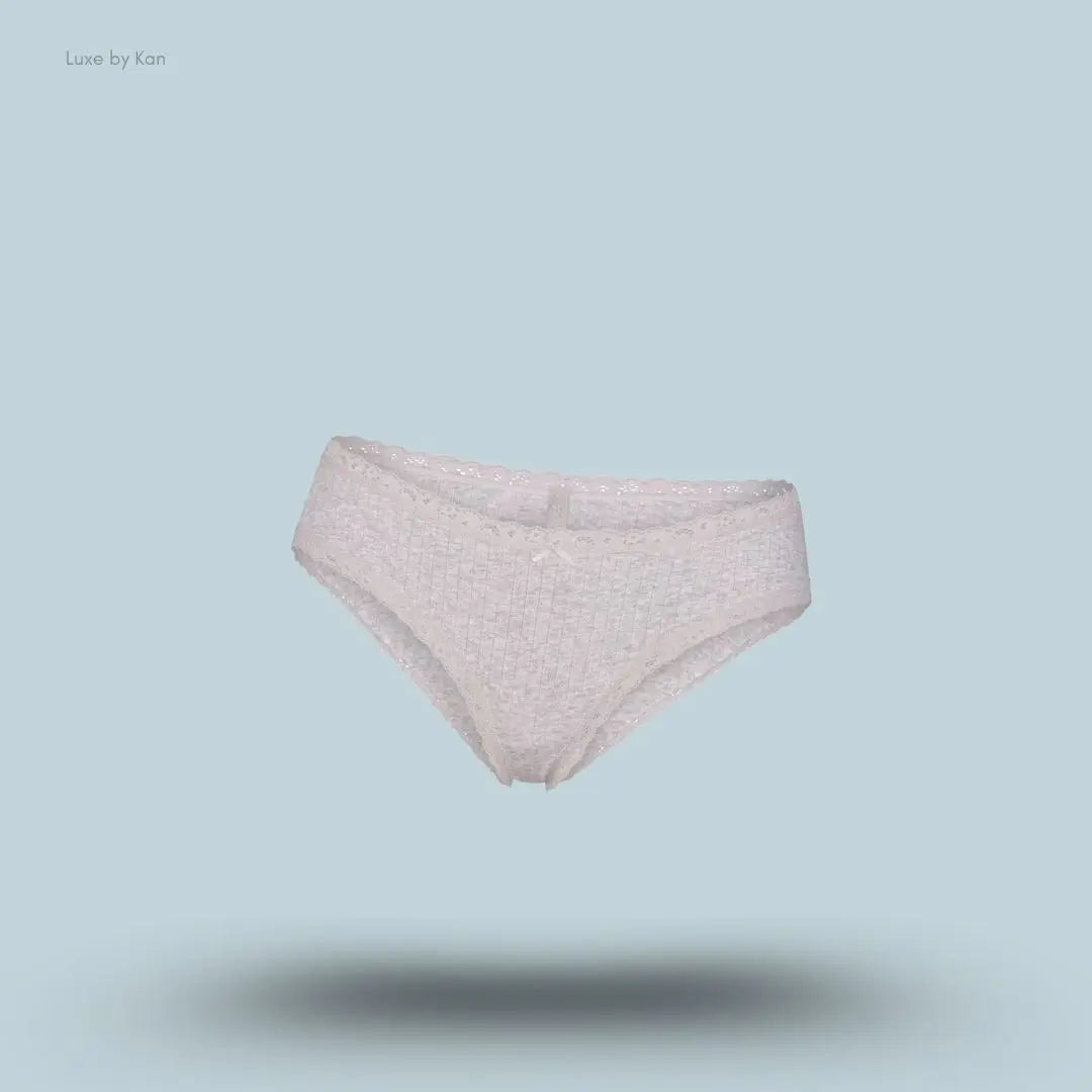 SKIMS Lightweight Cotton Pointelle Lace Brief in Light Heather Grey, flat lay on light blue background