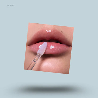 Flower Knows Shell's Jewel Nourishing Lip Glaze in P06 Lunar Jelly applied on lips, moonlight shimmer