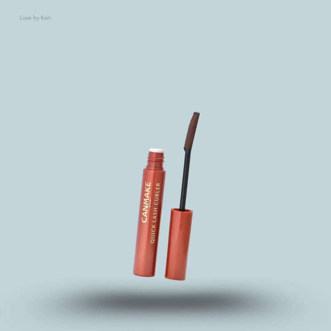 Canmake Quick Lash Curler in Baked Orange, mascara tube with cap off and straight wand
