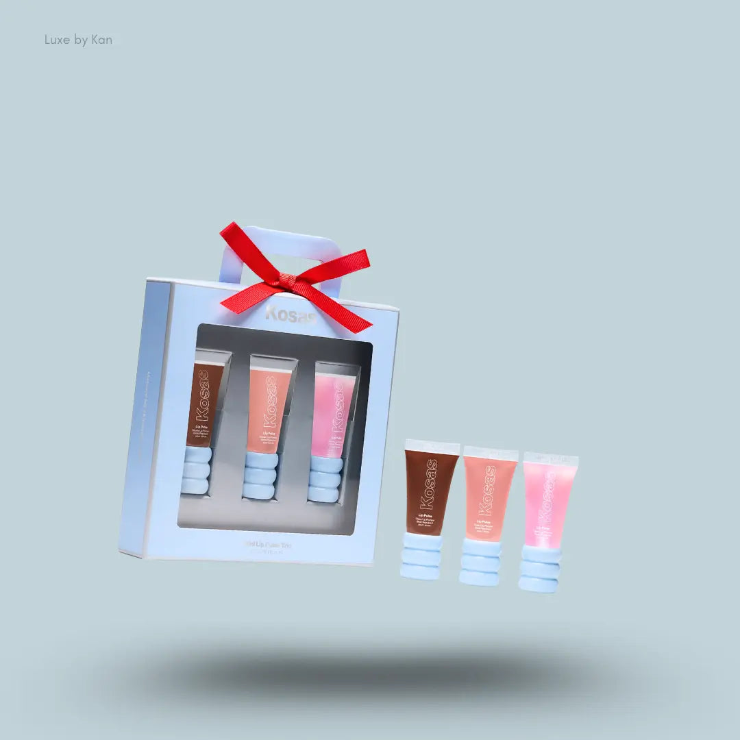 Kosas lip trio tubes with packaging on blue background