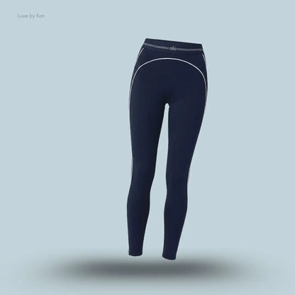 Alo Airbrush High-Waist Heart Throb Legging in Navy/White, flat lay on light blue background