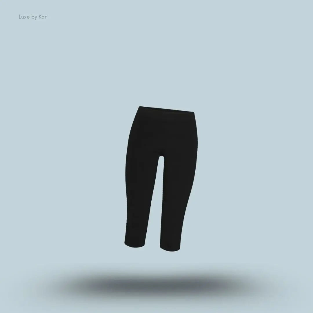 SKIMS Refined Knit Capri in Obsidian, flat lay on light blue background