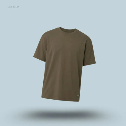Alo Double Take Short Sleeve in Olive Tree, flat lay on light blue background