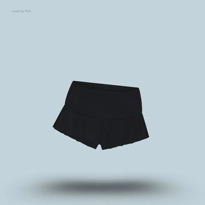 SKIMS Sleep Henley and Foldover Short Set foldover shorts in Onyx, flat lay on light blue background