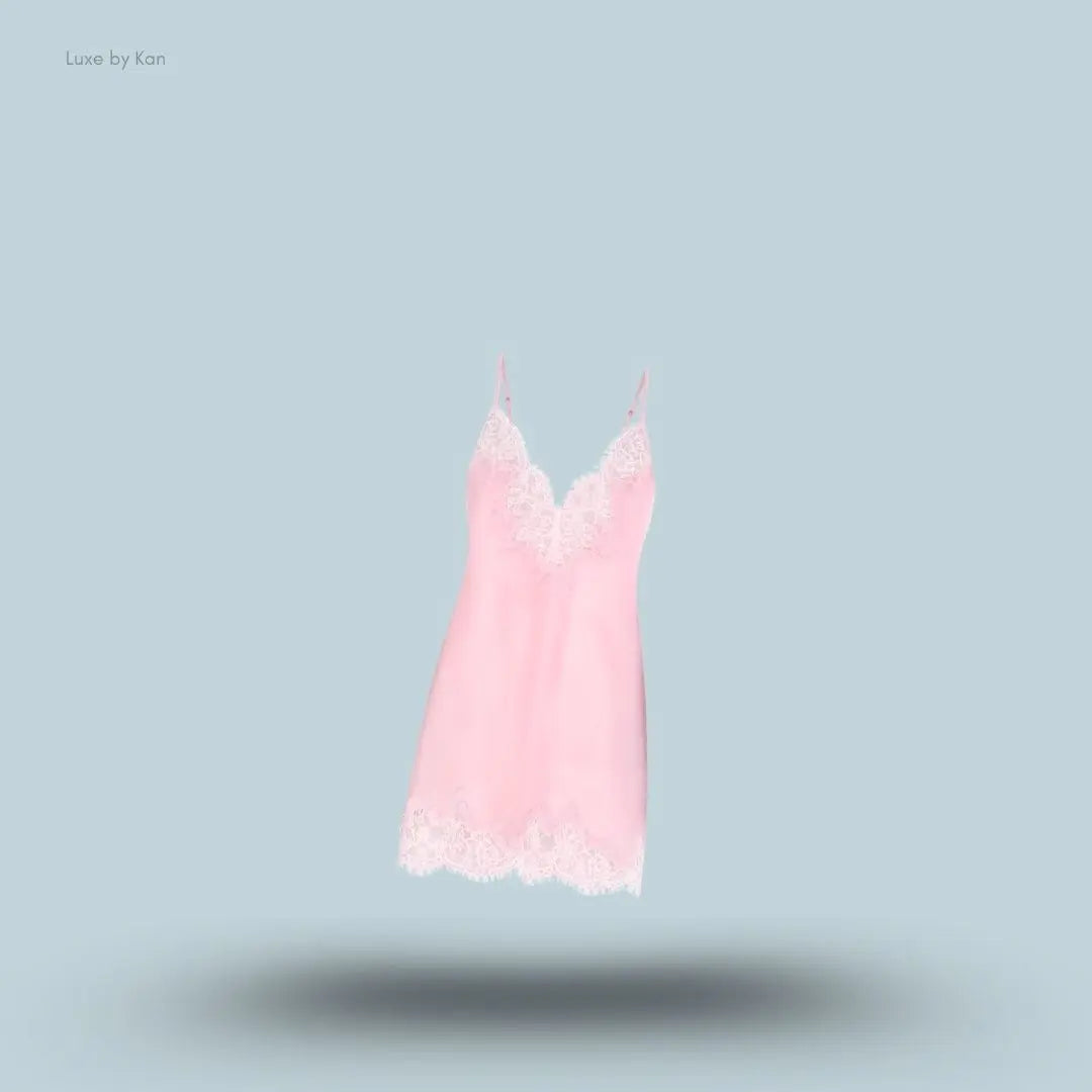 SKIMS Silk Lace Mini Slip Dress in Limited Edition Peony Tonal, flat lay on light blue background