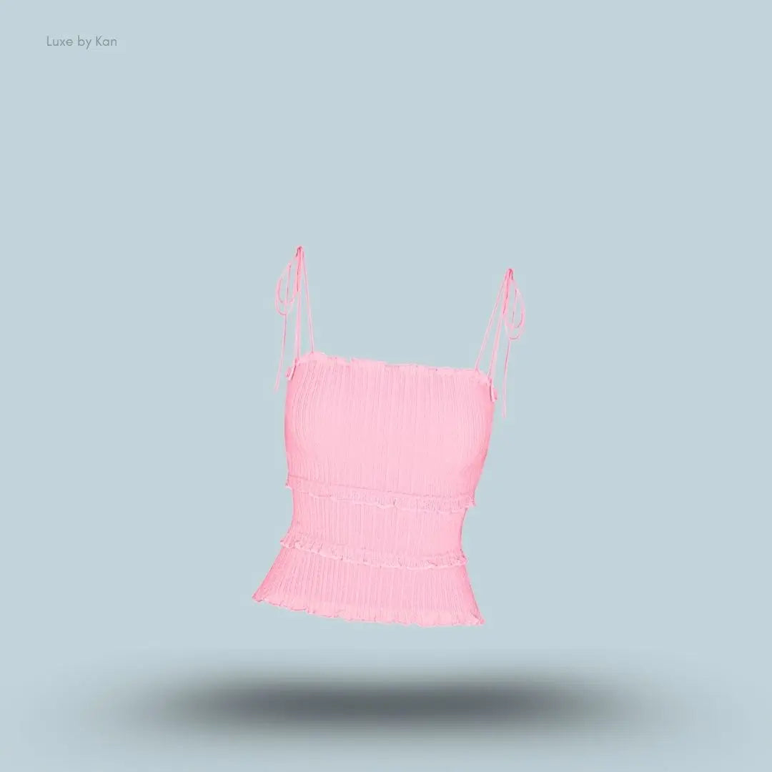 SKIMS Sheer Knit Ruffle Cami in Peony, flat lay on light blue background