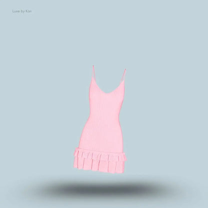SKIMS Sheer Knit Ruffle Dress in Peony, flat lay on light blue background