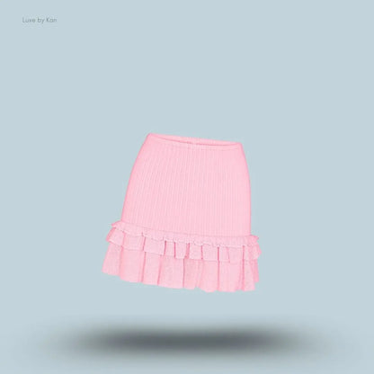 SKIMS Sheer Knit Ruffle Mini Skirt in Peony, flat lay on light blue background