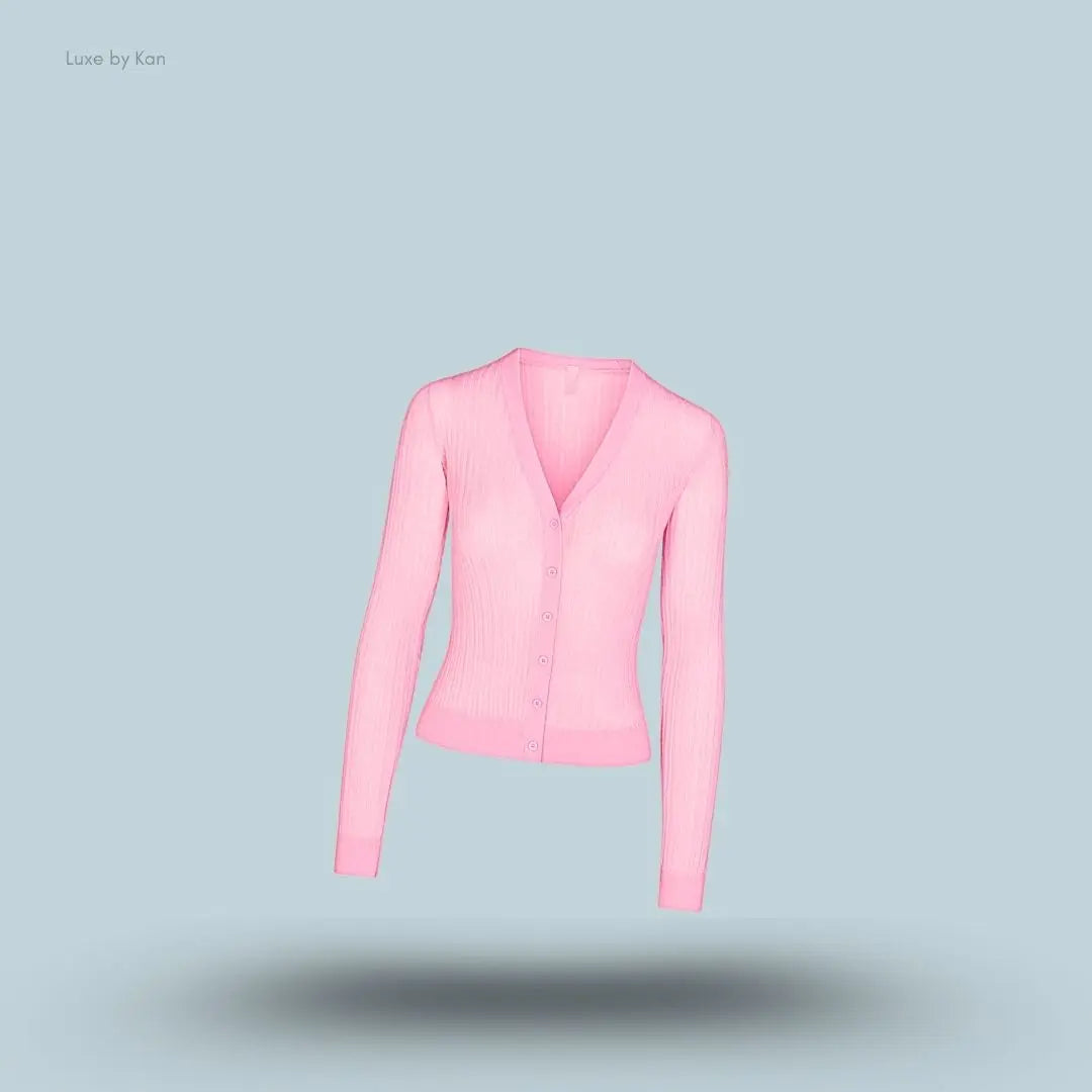 SKIMS Sheer Knit Cardigan in Peony, flat lay on light blue background