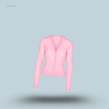 SKIMS Sheer Knit Cardigan in Peony, flat lay on light blue background