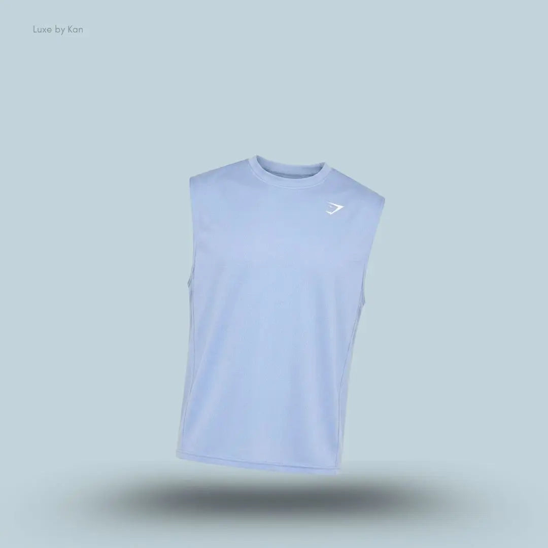 Gymshark Washed Pastels Tank in blue displayed on a blue background with a sleeveless athletic tank design