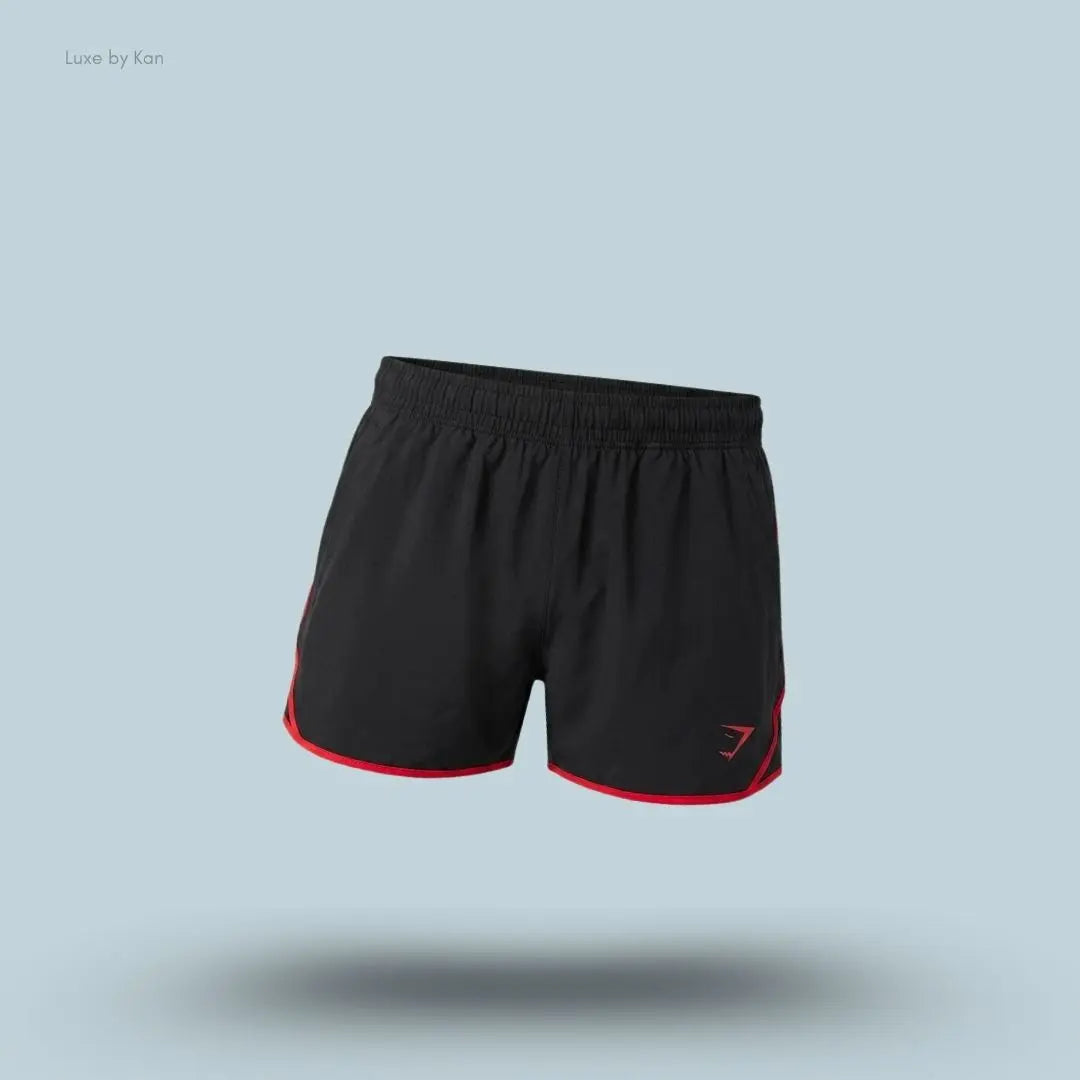 gymshark Accent Conditioning Shorts in black with red trim, lightweight men's training shorts with logo detail