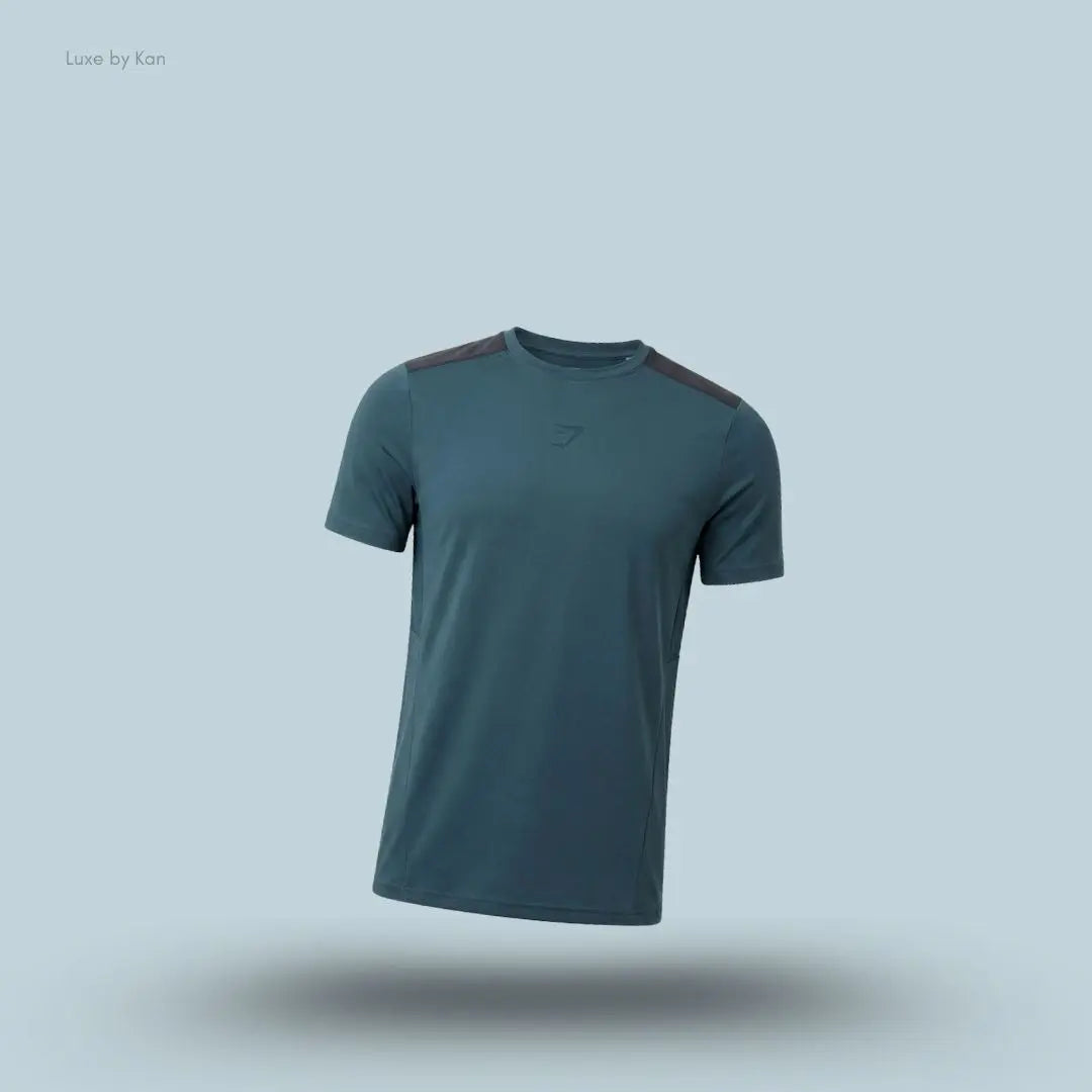 gymshark Sport T-Shirt in dark blue with short sleeves and front logo, men's slim-fit performance training tee on blue background.
