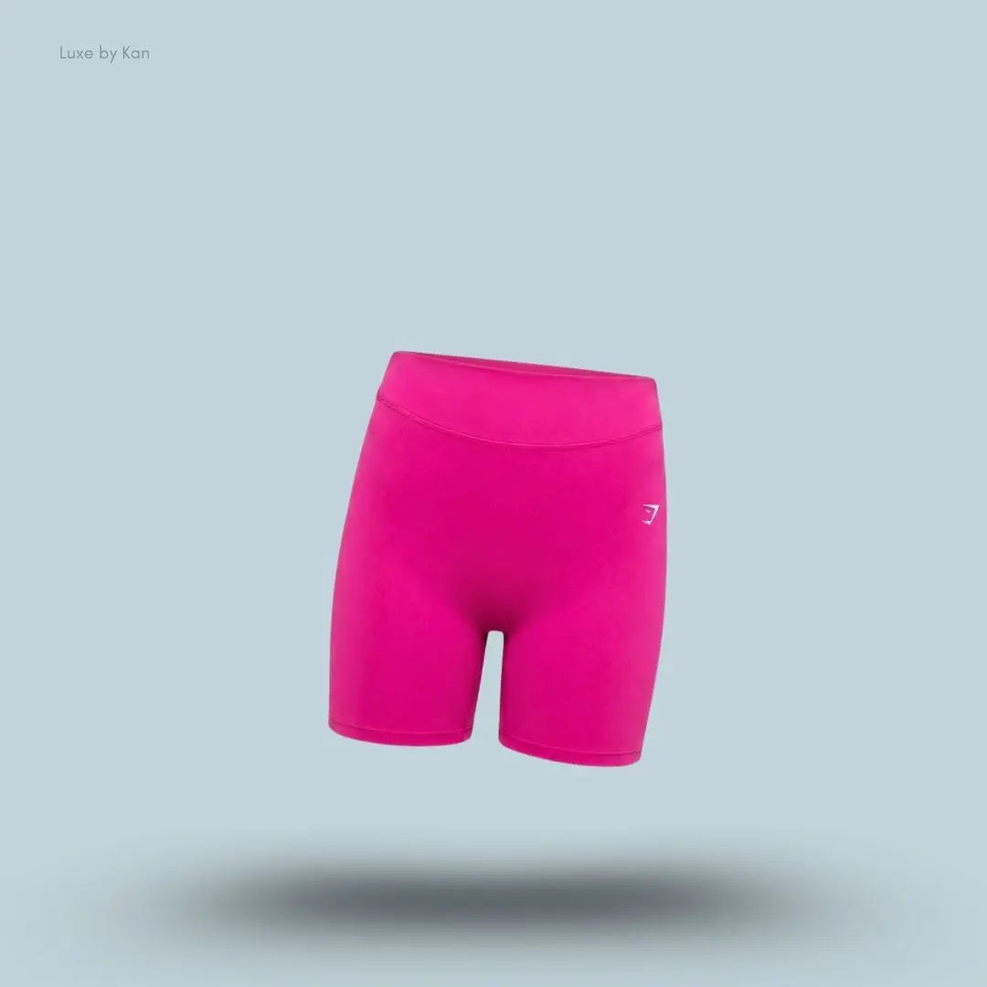 Gymshark Lifting Dipped Waistband Shorts pink high-waisted deep V back bum scrunch hidden pocket women's activewear shorts front view India
