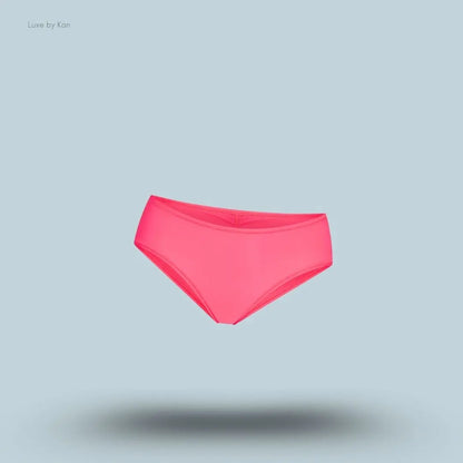 SKIMS Fits Everybody Micro Hipster in Ultra Pink, flat lay on light blue background