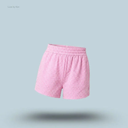 Gymshark Gingham Shorts Focus Pink Soft White oversized fit gingham pattern piping detail women's activewear shorts front view India