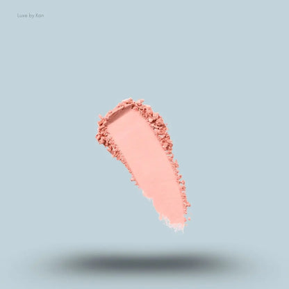 Kylie Cosmetics Pressed Blush Powder swatch on blue background — LBK India