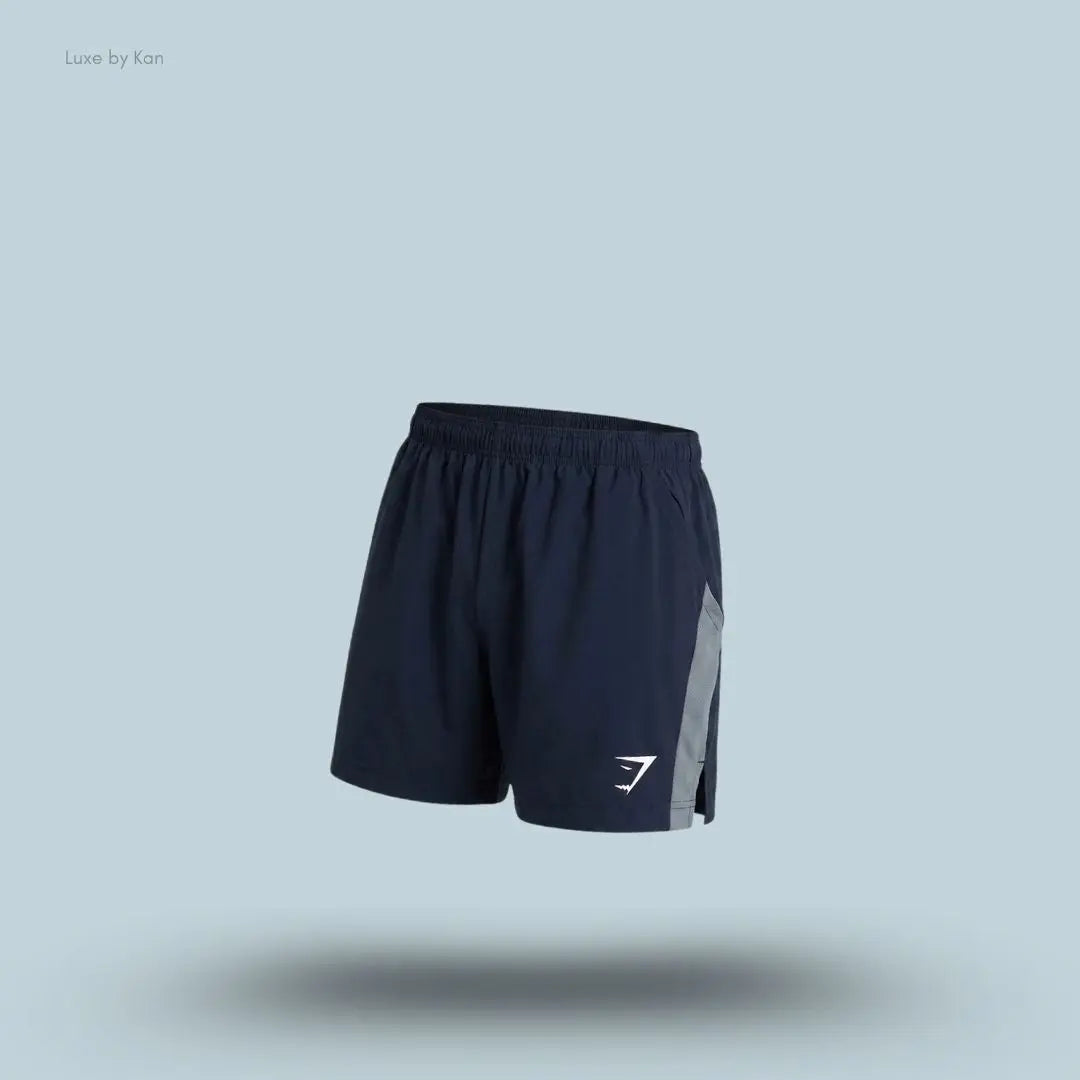 Gymshark Sport 5" Shorts men's slim-fit training shorts in hard blue with contrast side panels on a blue background