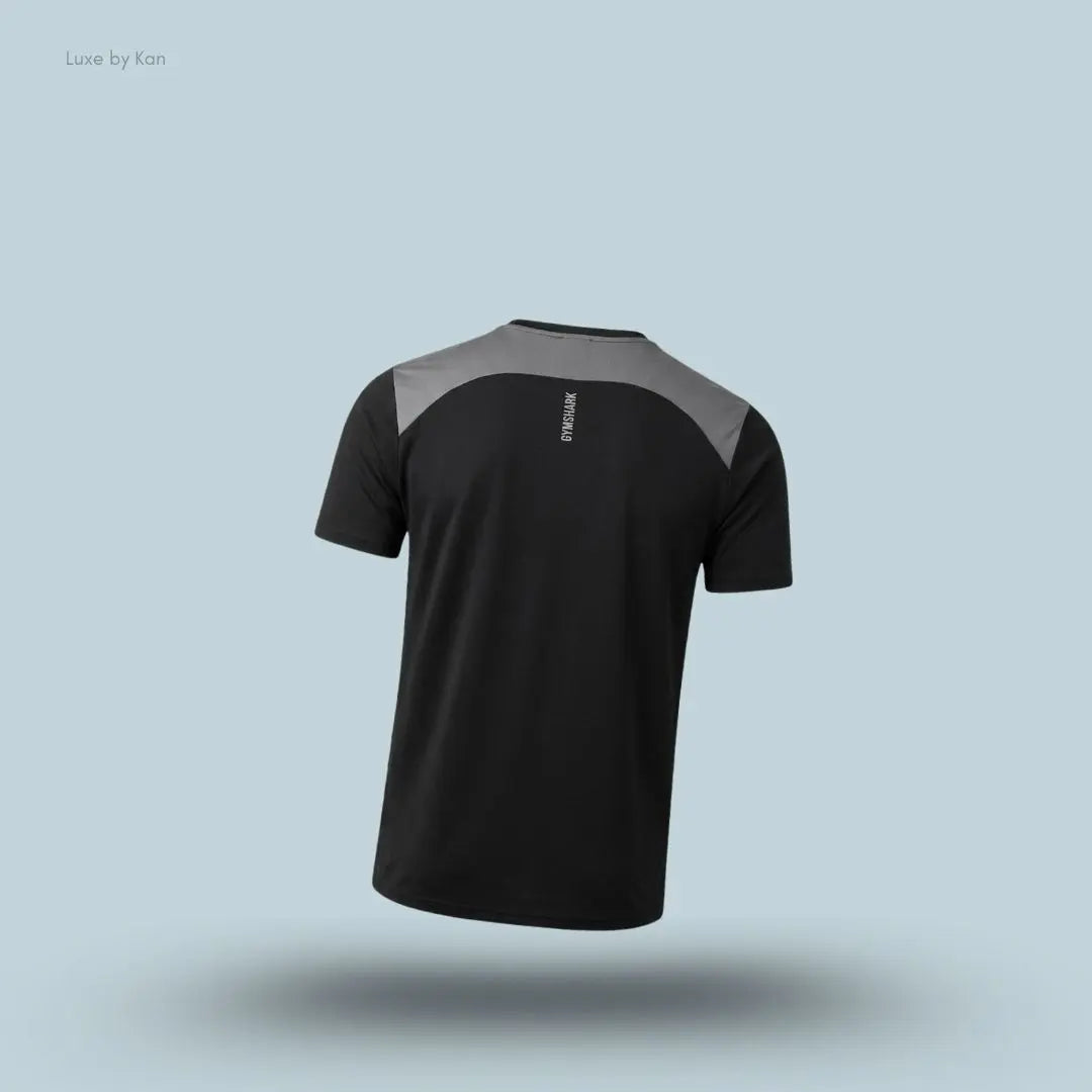 gymshark Sport T-Shirt in black with short sleeves and front logo, men's slim-fit performance training tee on blue background back view.