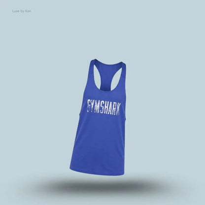 gymshark Accent Tank in blue with a racerback design, faded front Gymshark graphic and slim-fit sleeveless training tank displayed on blue background