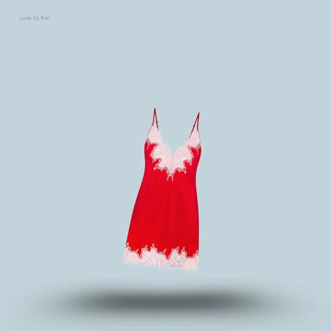 SKIMS Silk Lace Mini Slip Dress in Limited Edition Ruby Contrast, flat lay on light blue background