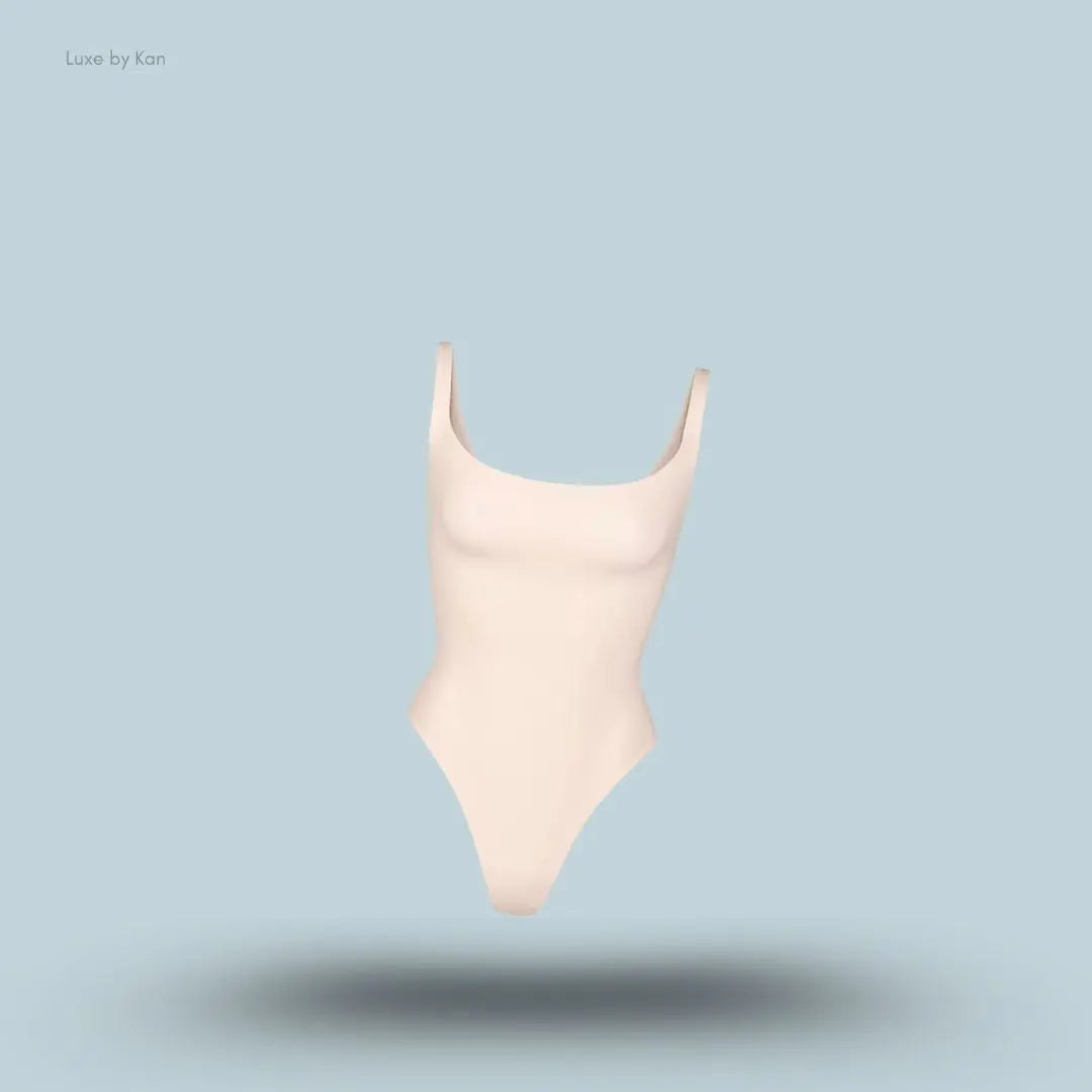 SKIMS Fits Everybody Square Neck Stretch Jersey Body in nude, front view on a light blue background with floating product display.
