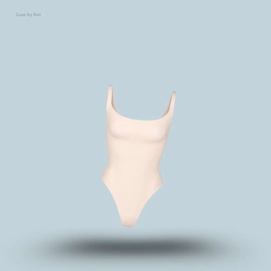 SKIMS Fits Everybody Square Neck Stretch Jersey Body in nude, front view on a light blue background with floating product display.