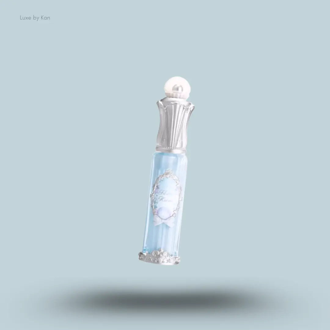 Flower Knows Shell's Jewel Nourishing Lip Glaze in P04 Seafoam Glow, pearlescent gloss with seashell cap