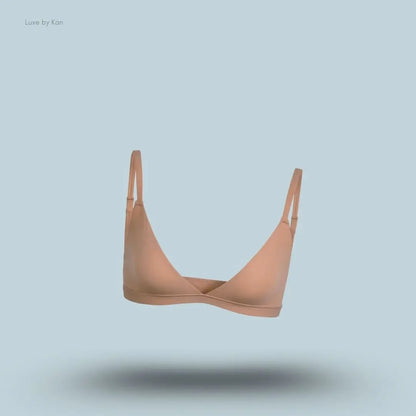 Skims Fits Everybody Triangle Bralette in nude, front view on a light blue background with a floating product display.