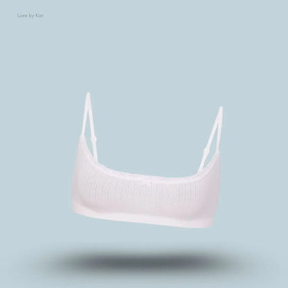 SKIMS Lightweight Cotton Pointelle Scoop Bralette in Snow, flat lay on light blue background